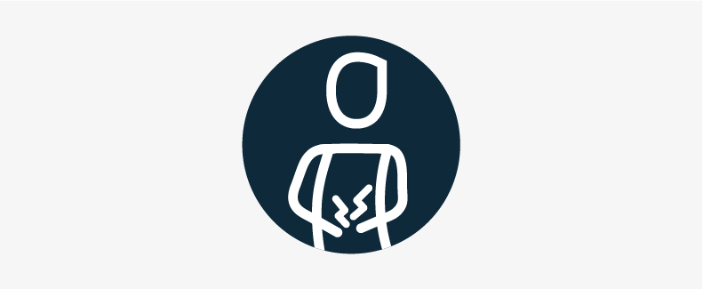 A person holding a painful tummy